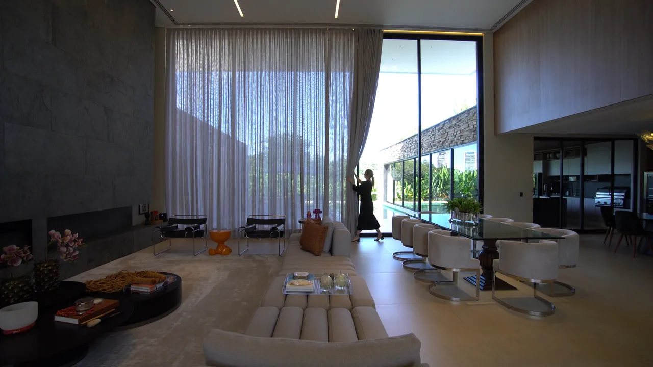Sala de estar assinada com acabamentos Spazio Bello